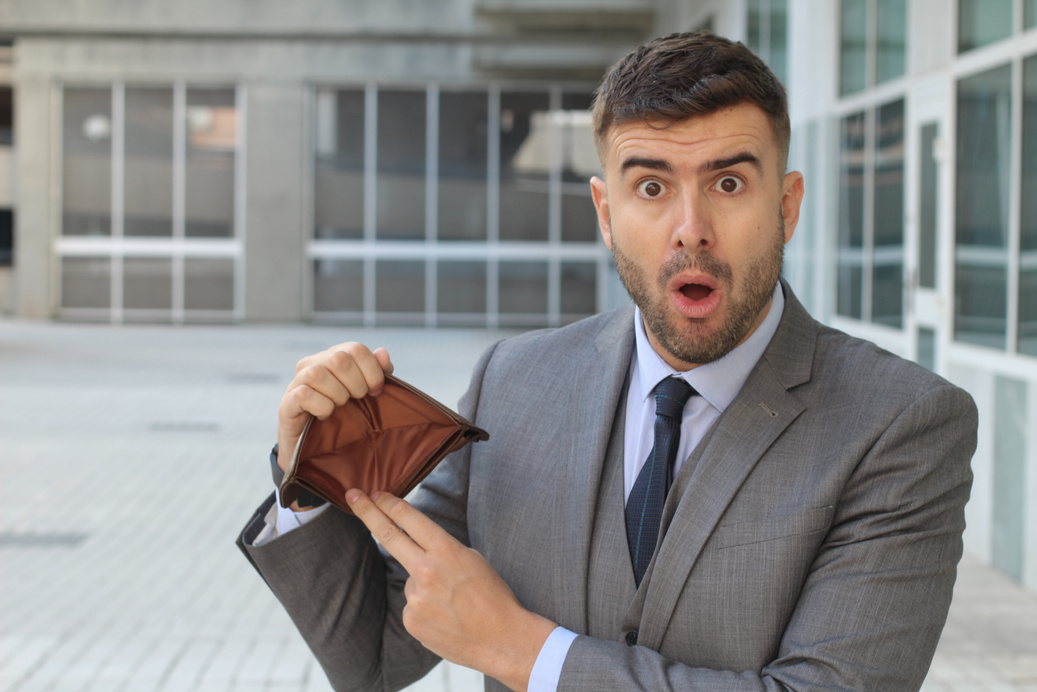 Shocked man with no money